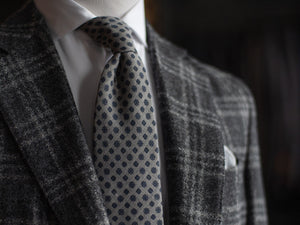 Wearing A Gray Sport Coat