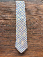 100% SILK CHAMPAGNE AND BLUE WOVEN NEATS TIE, THE LABEL