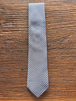 100% SILK BLUE WOVEN NEATS TIE, THE LABEL