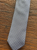 100% SILK BLUE WOVEN NEATS TIE, THE LABEL