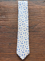 100% SILK WHITE AND BLUE PAISLEY PRINT TIE, THE LABEL